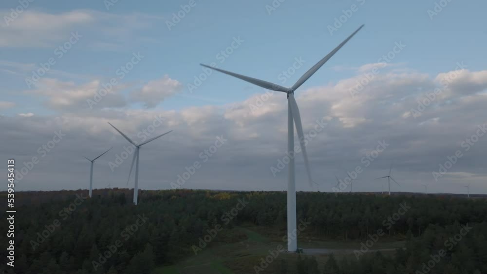 low angle flying counter clockwise around wind turbines in upstate NY low angle flying counter clockwise around wind turbines in upstate NY