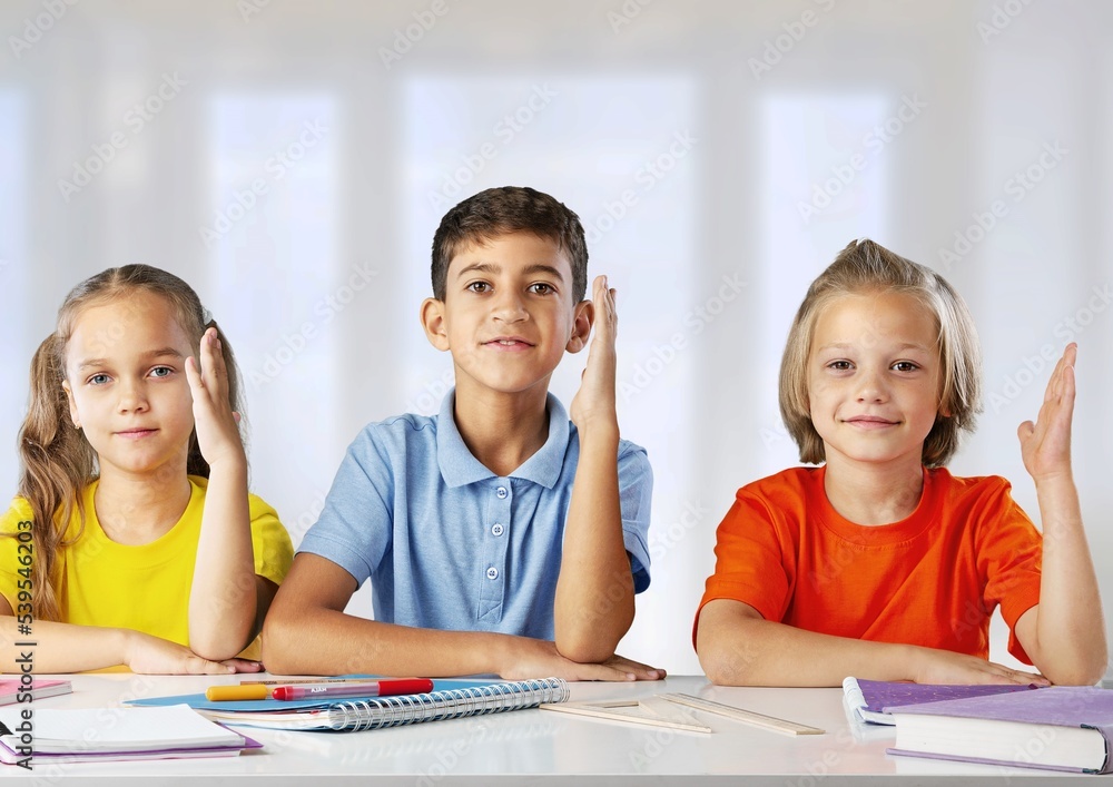 Happy school children study in school class. Happy school children study in school class.