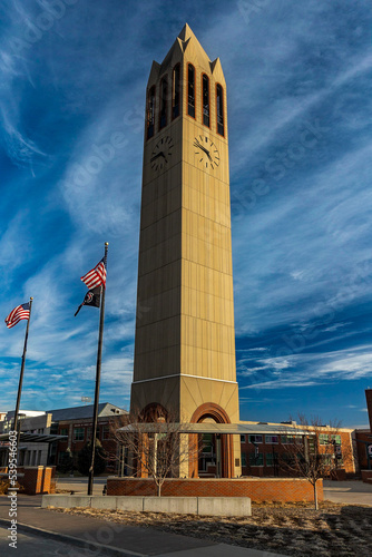 University of Nebraska Omaha Public Campus Clock Tower with American flags