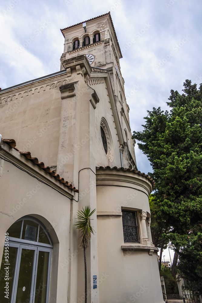 View of Notre Dame des Pins parish church (Notre-Dame-des-Pins, was built in 1865) at avenue Prince-de-Galles. Cannes, France.