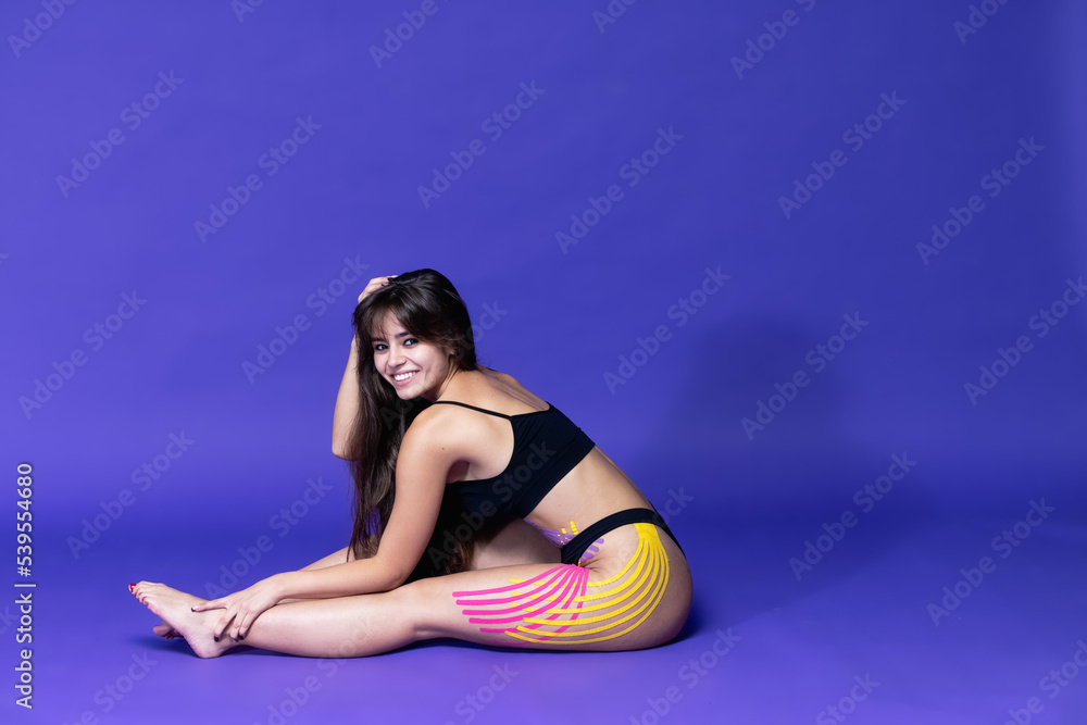 Aesthetic taping for cellulite removal. Cellulite treatment. .Body care modern treatment for tighten skin muscle tissue and improve blood circulation. Anti-cellulite. Sport. Beautiful body.Care. Aesthetic taping for cellulite removal. Cellulite treatment. .Body care modern treatment for tighten skin muscle tissue and improve blood circulation. Anti-cellulite. Sport. Beautiful body.Care.