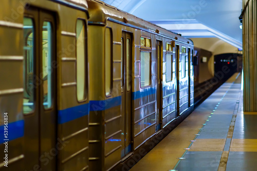 Old-style metro cars leave for the tunnel