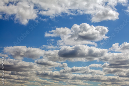 Blue Sky and Puffy Clouds
