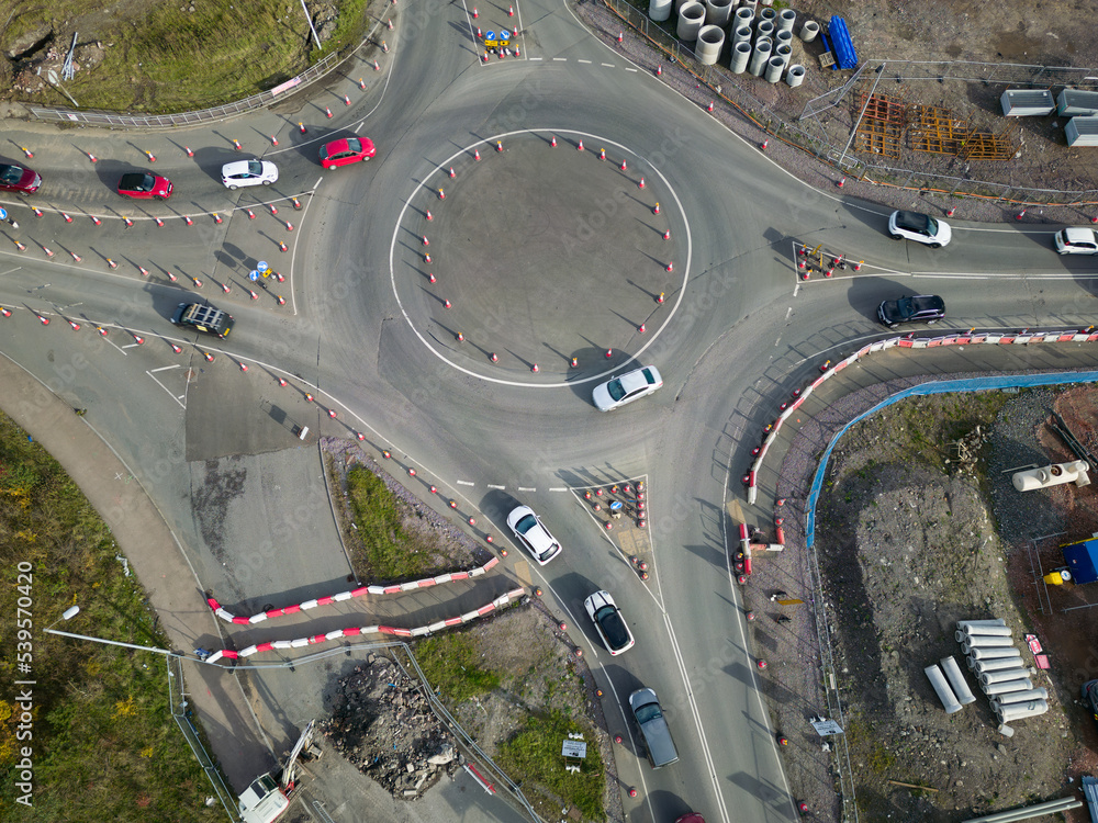 Aerial view of a temporary roundabout made from traffic cones in major roadworks - obrazy, fototapety, plakaty 