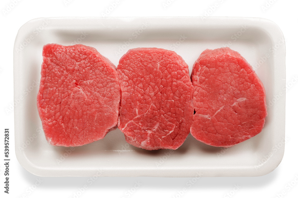 Fresh red meat packed in a poly bag. Isolated over white Fresh red meat packed in a poly bag. Isolated over white