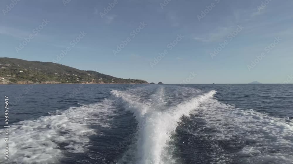 Trail boat during sea trip in holidays. Foamy waves on the surface of the sea. Fast speed boat trail on the sea in natural color - no filter - Trail boat during sea trip in holidays. Foamy waves on the surface of the sea. Fast speed boat trail on the sea in natural color - no filter -