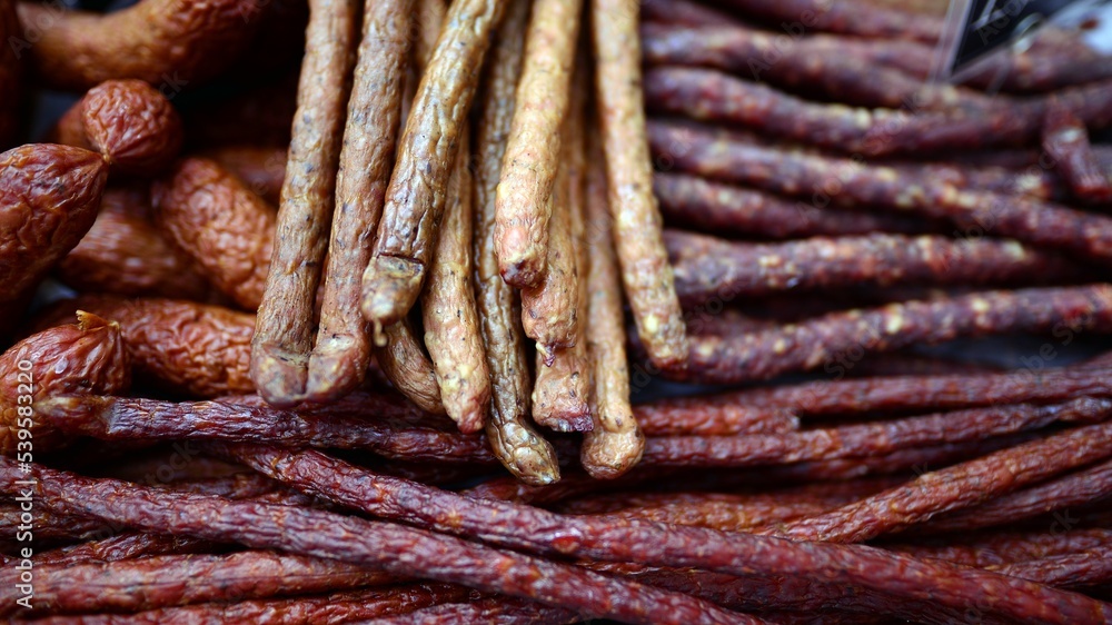 Smoked meat products. Tasty display of sausage and cold cuts. Smoked meat products. Tasty display of sausage and cold cuts.