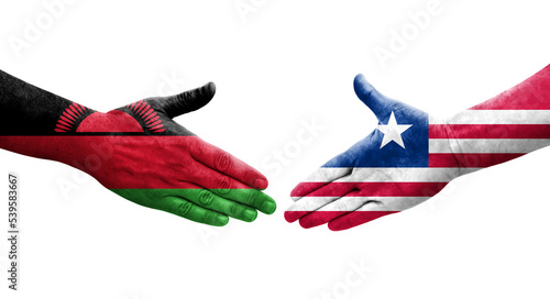 Handshake between Liberia and Malawi flags painted on hands, isolated transparent image.