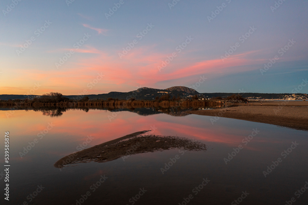 Beautiful sunset sky over the river Ter in catalunia, Spain.