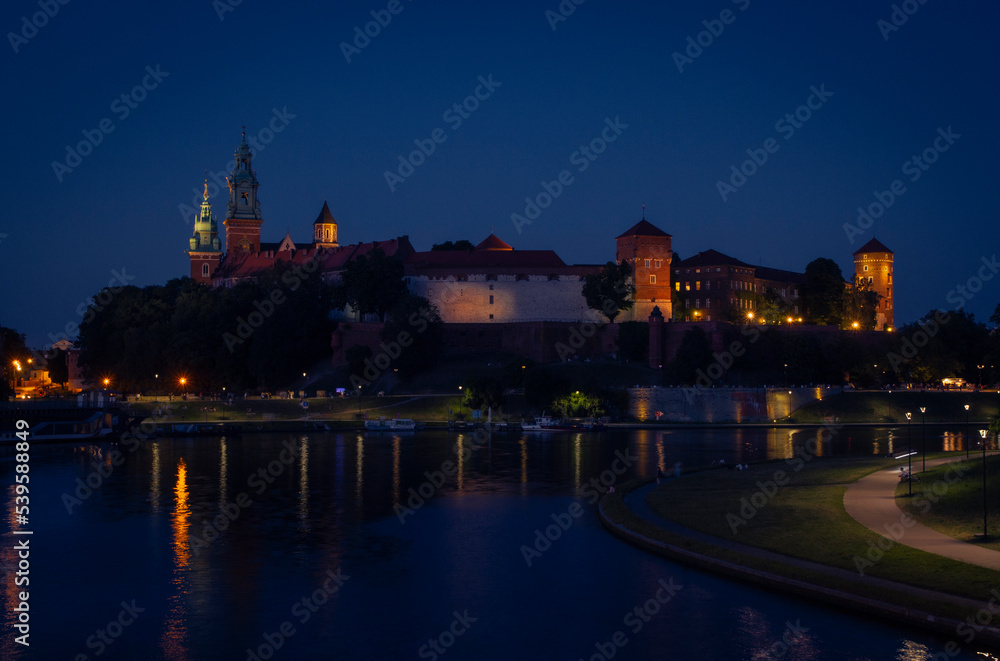 Wawel Castle by Night in Cracov - obrazy, fototapety, plakaty 