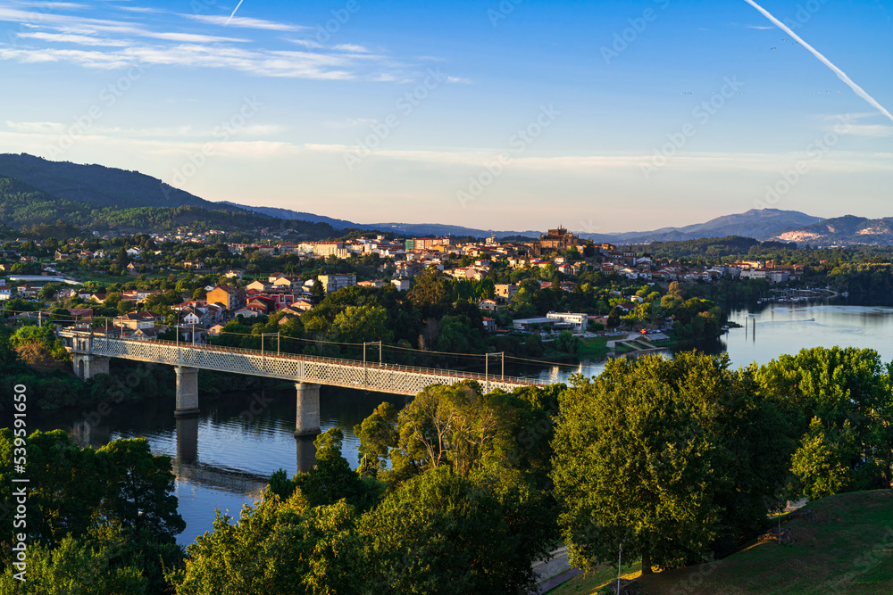 View of the Minho river and the beautiful medieval town of Tui. Photography made in Valença, Portugal.