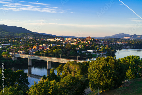 View of the Minho river and the beautiful medieval town of Tui. Photography made in Valença, Portugal.