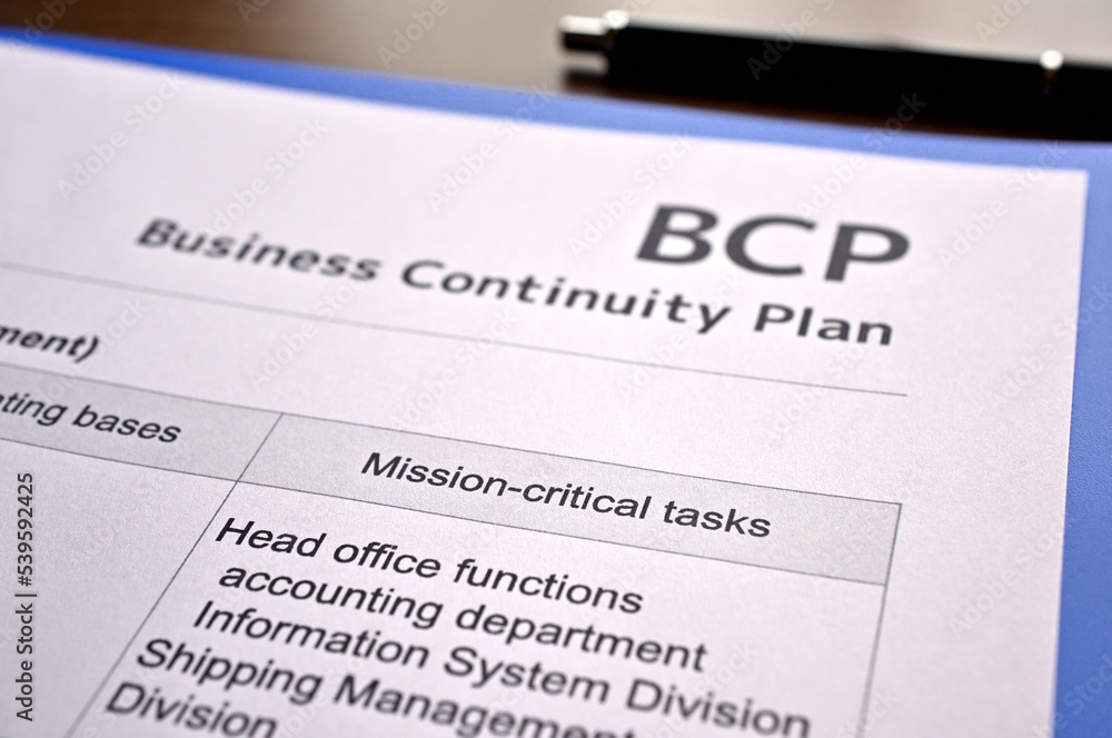 There is dummy documents that created for the photo shoot on the desk about Business Continuity Plan. There is dummy documents that created for the photo shoot on the desk about Business Continuity Plan.