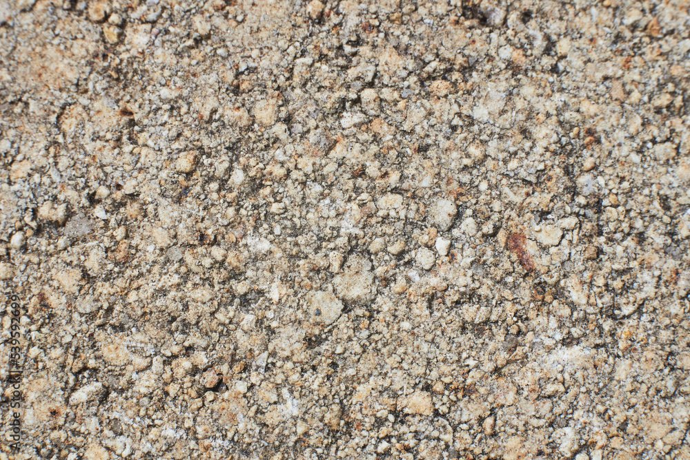 Stone texture of the old brick. Close-up of rough grainy textured brick. Abstract natural background Stone texture of the old brick. Close-up of rough grainy textured brick. Abstract natural background