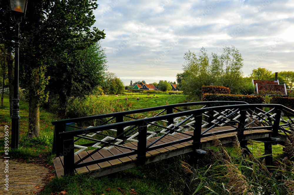 Netherland's Landscape of an authentic Holland or Dutch village in the distance. Netherland's Landscape of an authentic Holland or Dutch village in the distance.