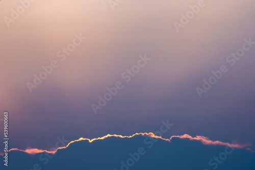 Clouds Silver Lining Fades Into Purple Evening Sky