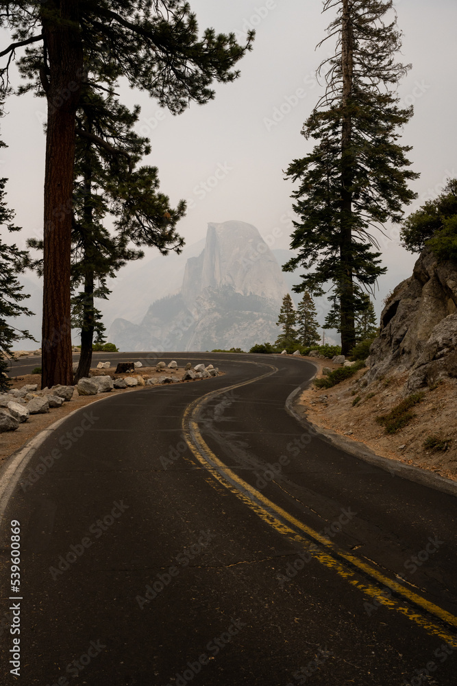 Fototapeta premium Curve of Glacier Point Road On Smoky Day