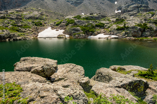 Fototapeta Naklejka Na Ścianę i Meble -  Deep Green Color of Glass Lake