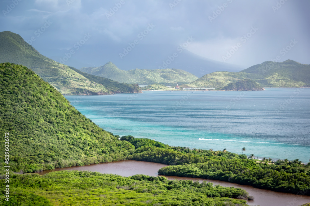 A seascape view at the shore of St. Kitts close to the capital city of Basseterre, looking out over the Caribbean Sea.