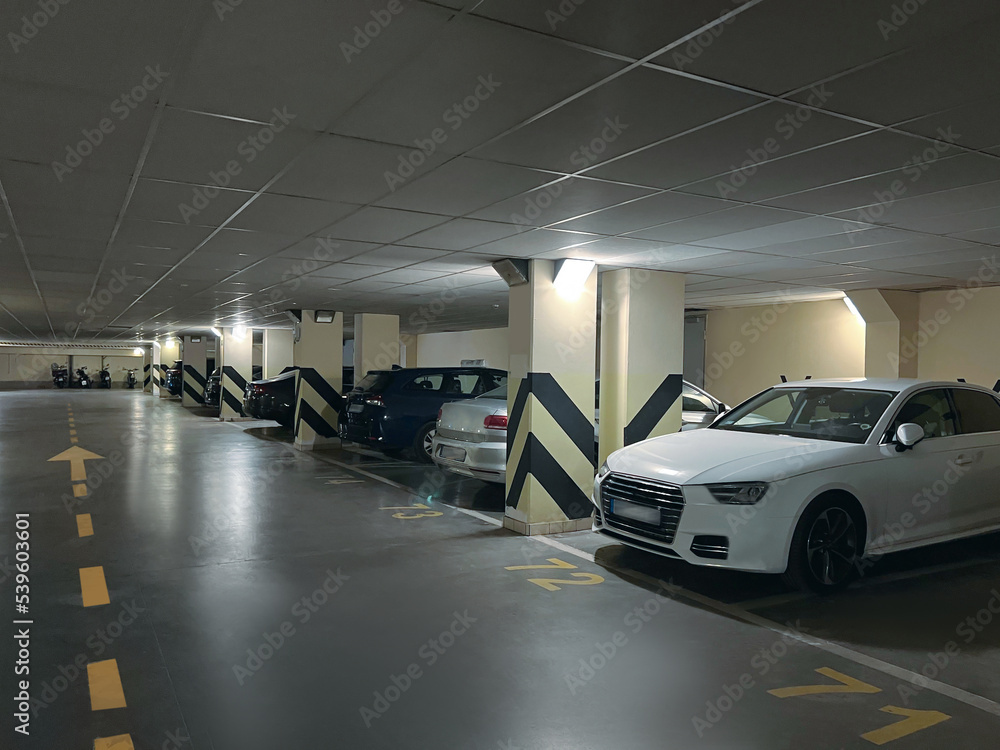 View of different cars in underground parking View of different cars in underground parking