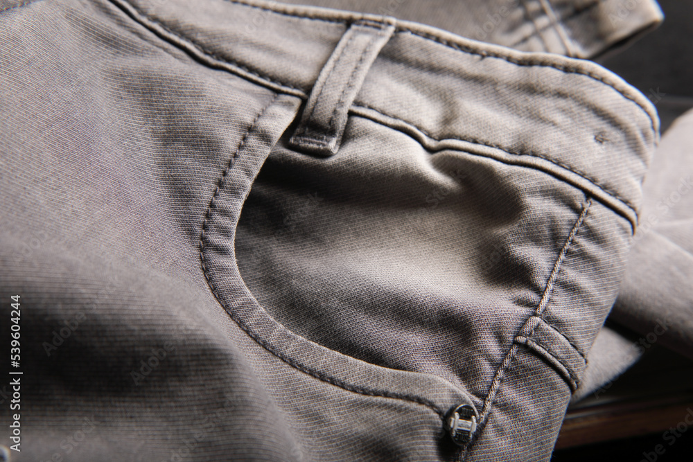 Close up shot of Indian made black jean
Close up shot of Indian made black jean