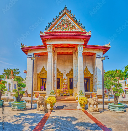 Panorama of the facade of Ubosot of Wat Bowonniwet Vihara in Bangkok, Thailand photo