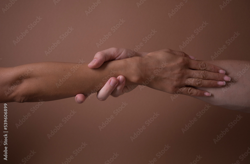 handshake between two people. Couple in love. Gesture. Hand. Photo. Background. 