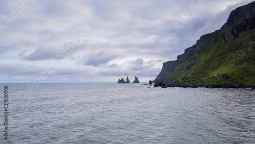 Beautiful aerial view of the town of Vik near the black sand beach and the basalt rock formations in Iceland