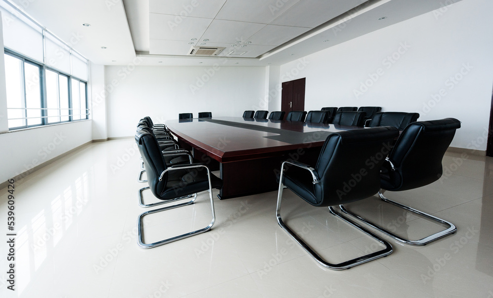 Conference table and chairs in modern meeting room