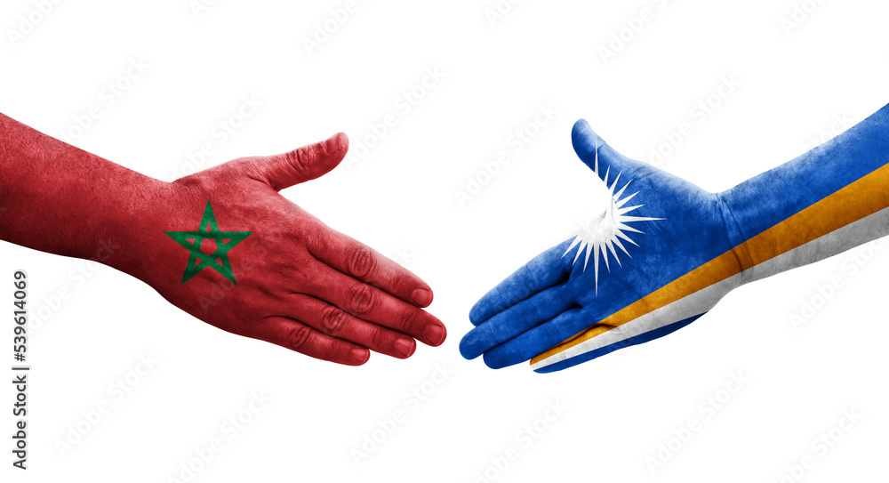 Handshake between Marshall Islands and Morocco flags painted on hands, isolated transparent image. Handshake between Marshall Islands and Morocco flags painted on hands, isolated transparent image.