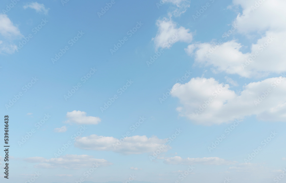 Beautiful clouds during spring time in a Sunny day. Blue sky and white fluffy clouds