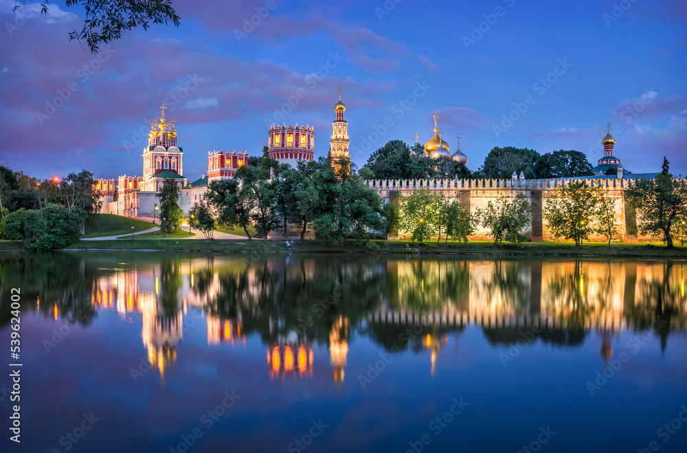 Temples and towers of the Novodevichy Convent and reflection, Moscow