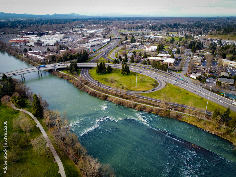 aerial view of the Willamette River under a bridge 