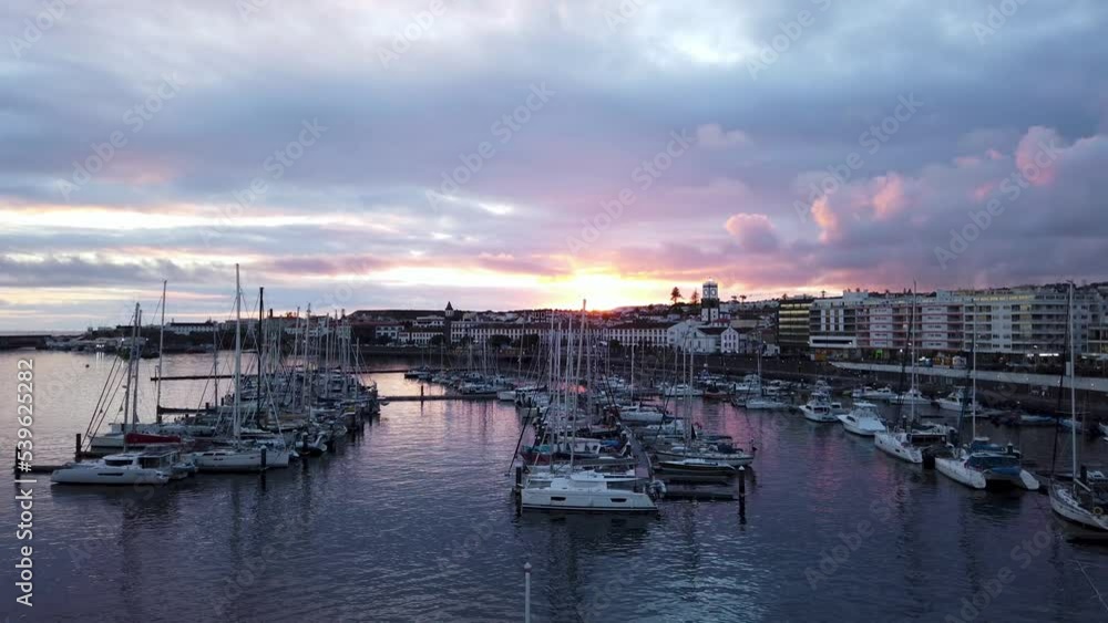 Ponta Delgada Cityscape View at Harbor during Sunset in the Azores Ponta Delgada Cityscape View at Harbor during Sunset in the Azores