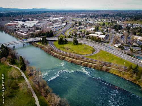 aerial view of the Willamette River under a bridge 