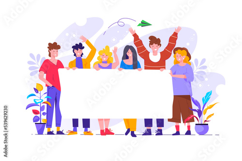 Group of young men and women standing together and holding blank banner