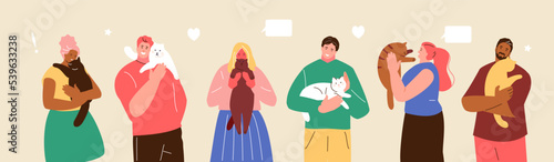 Happy cat owners with their pets in their arms. Friendship and care for pets
