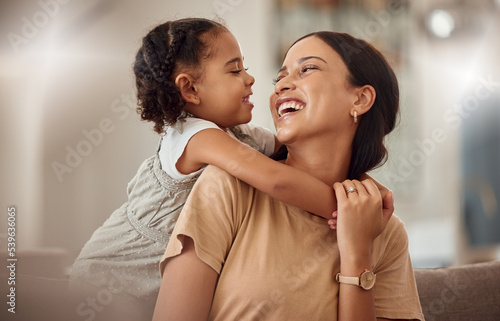 Happy mama with girl child, hug in home and weekend play time lifestyle for mom parent Fototapet