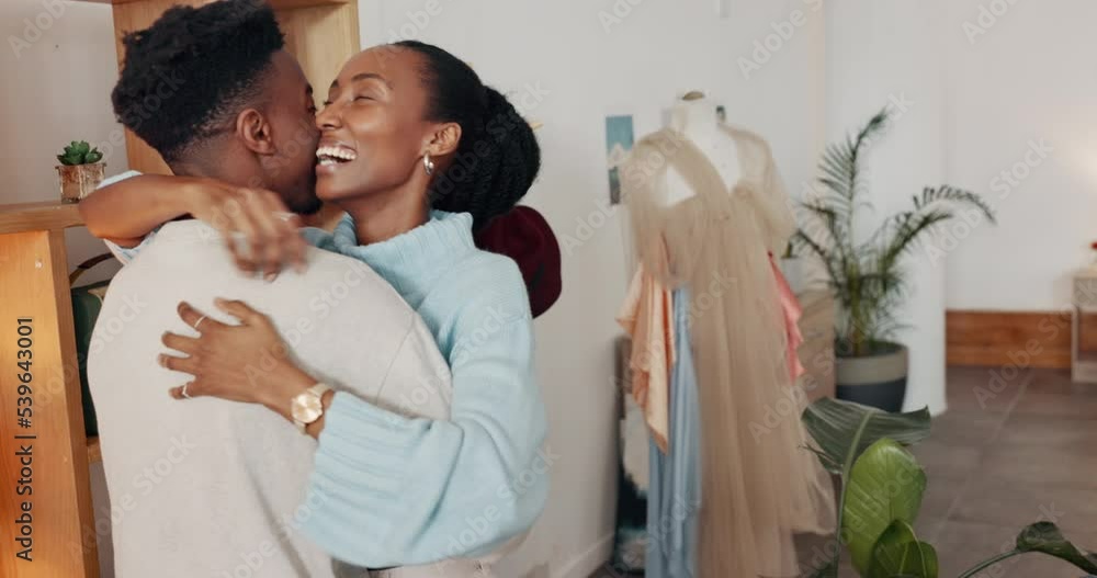 Dance, happy and couple with hug in the living room of their house together. Smile, playful and dancing African man and woman bonding with affection, care and love in the lounge of their home Dance, happy and couple with hug in the living room of their house together. Smile, playful and dancing African man and woman bonding with affection, care and love in the lounge of their home