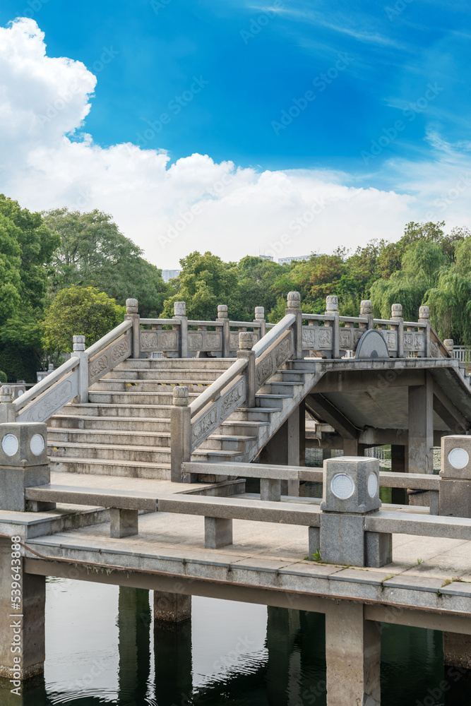 stone footbridge in an Asian garden stone footbridge in an Asian garden