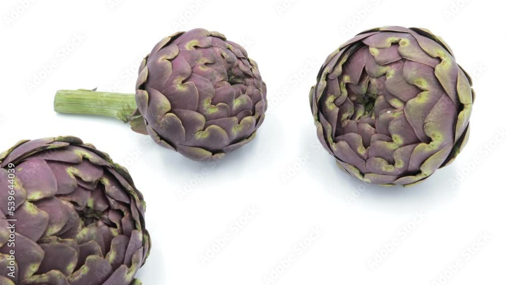 Fresh organic Artichokes on white background Fresh organic Artichokes on white background