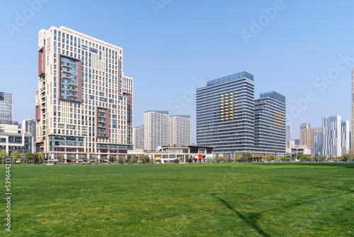 city park with modern building background in shanghai