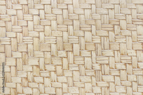 Old bamboo weaving pattern  woven rattan mat texture for background and design art work.