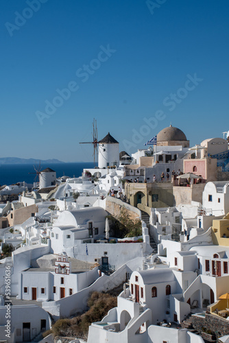 Townscape at oia with windmills in background