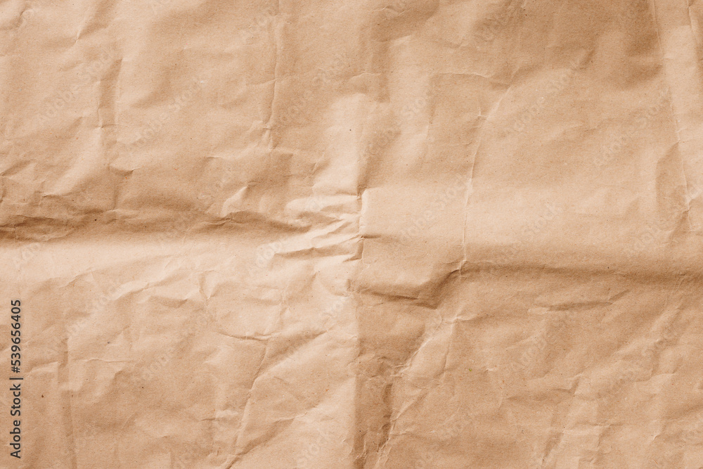 Crumpled cream craft paper. Background texture. Crumpled cream craft paper. Background texture.