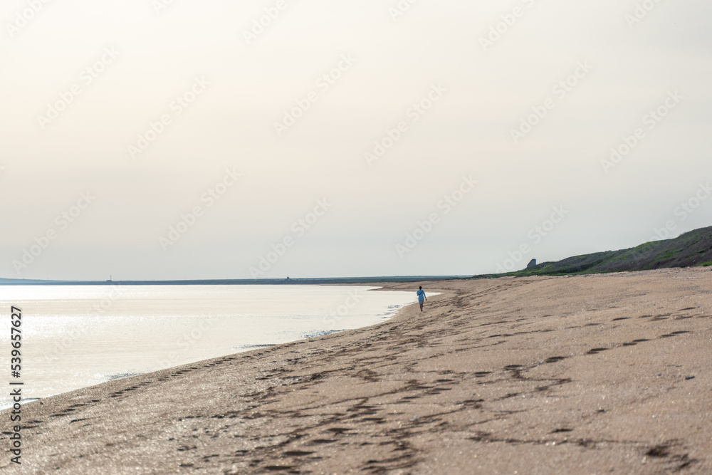 Human footprint on sand summer beach background with copyspace