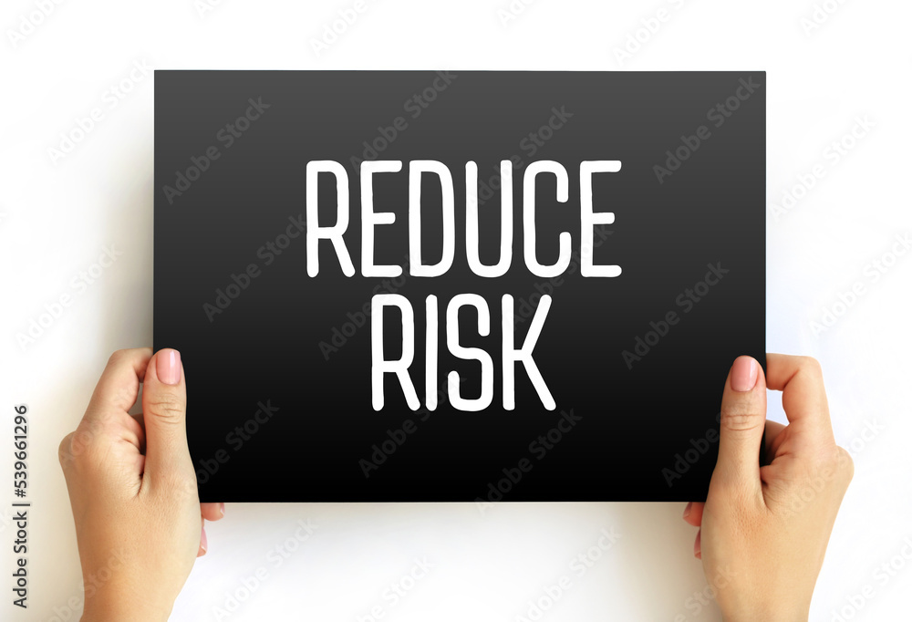 Reduce Risk text on card, concept background Reduce Risk text on card, concept background