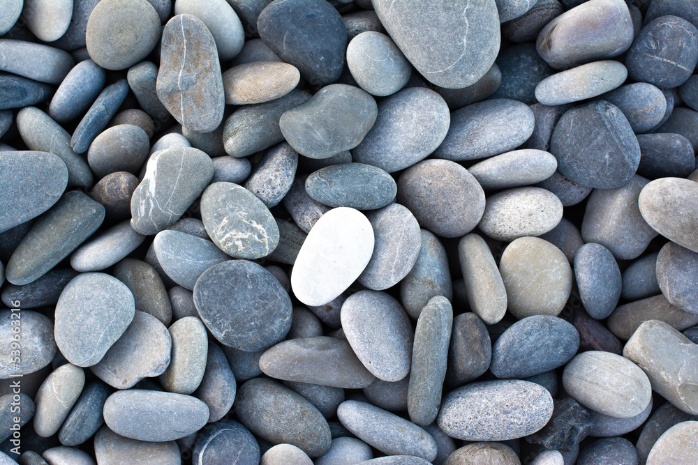 Smooth round pebbles sea texture background. Summer day. Smooth round pebbles sea texture background. Summer day.