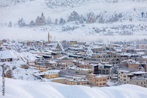 Pigeon Valley and Cave town in Goreme during winter time. Cappadocia, Turkey. 