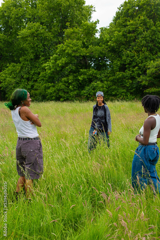 Fototapeta premium Three black friends out in nature.